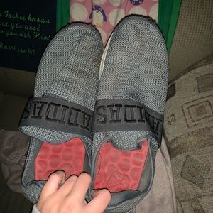 Grey adidas slip on sneakers